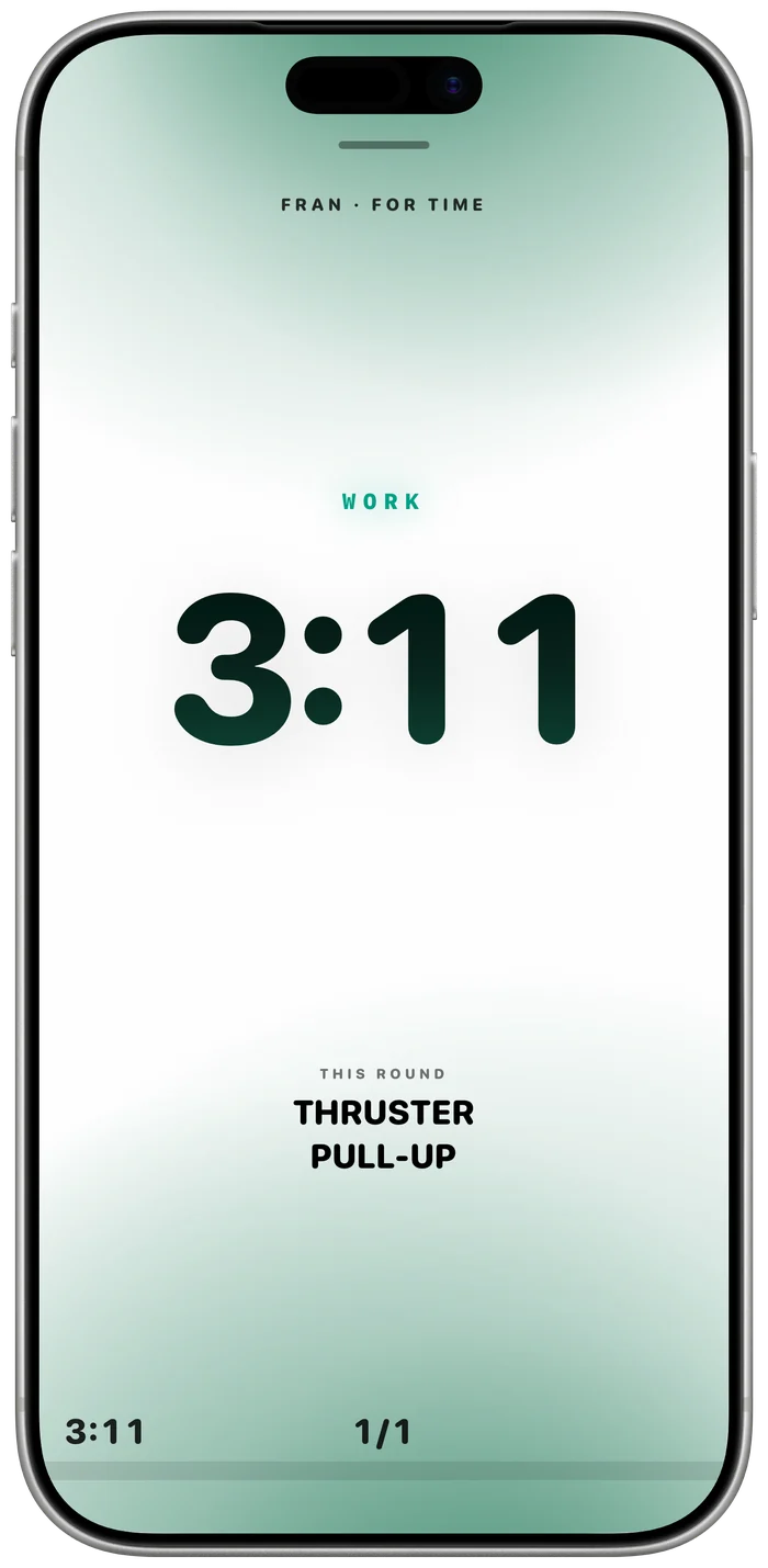 Fran running on the Stage: 3:11 in huge digits, WORK above, thrusters and pull-ups below, inside a green aura.
